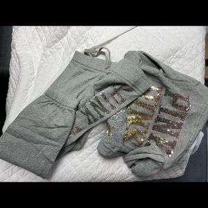 Victoria secret jump suit. Winched at ankle. Zip up.